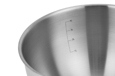Stainless steel mixing bowl with measurement markings for precise cooking.