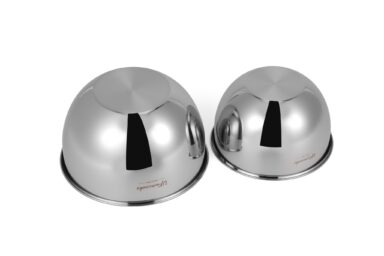 Polished stainless steel kitchenware bowls with reflective surfaces.