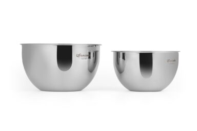 Two polished stainless steel mixing bowls on a white background.