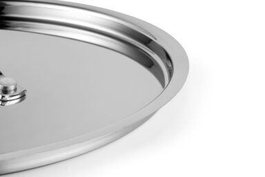 Shiny stainless steel serving tray with a smooth, reflective surface and raised edge.